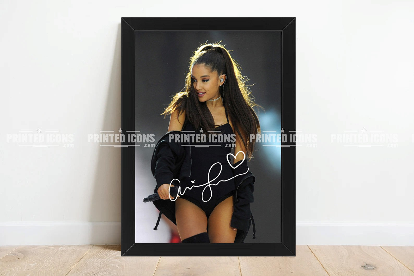 Ariana Grande framed autograph print displayed as wall art