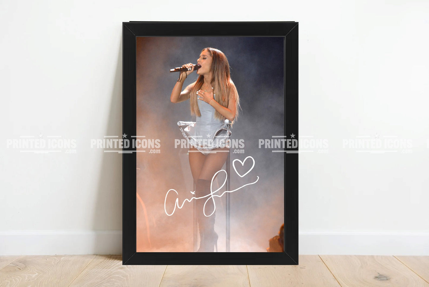 Framed Ariana Grande concert photo with reproduced autograph