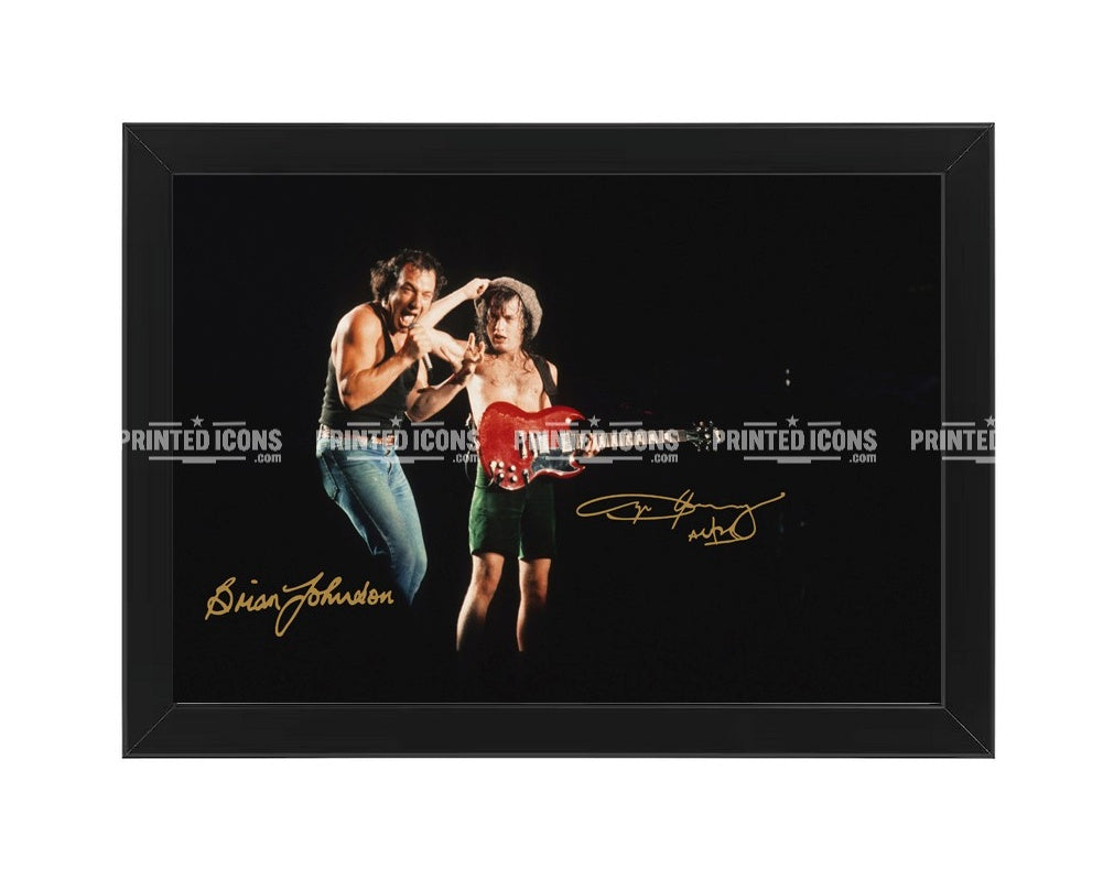 AC/DC signed photo print featuring Angus Young and Brian Johnson with reproduced autographs