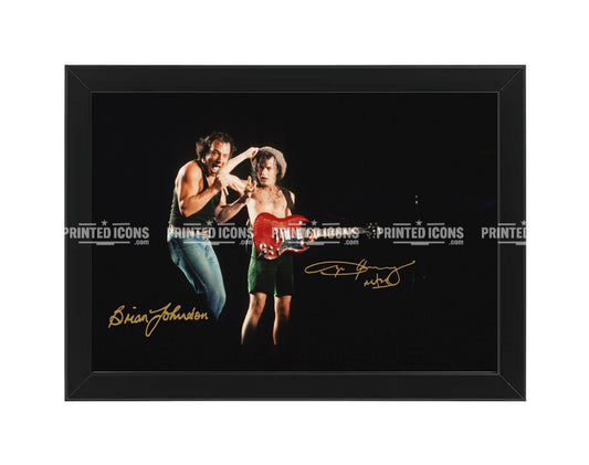 AC/DC signed photo print featuring Angus Young and Brian Johnson with reproduced autographs