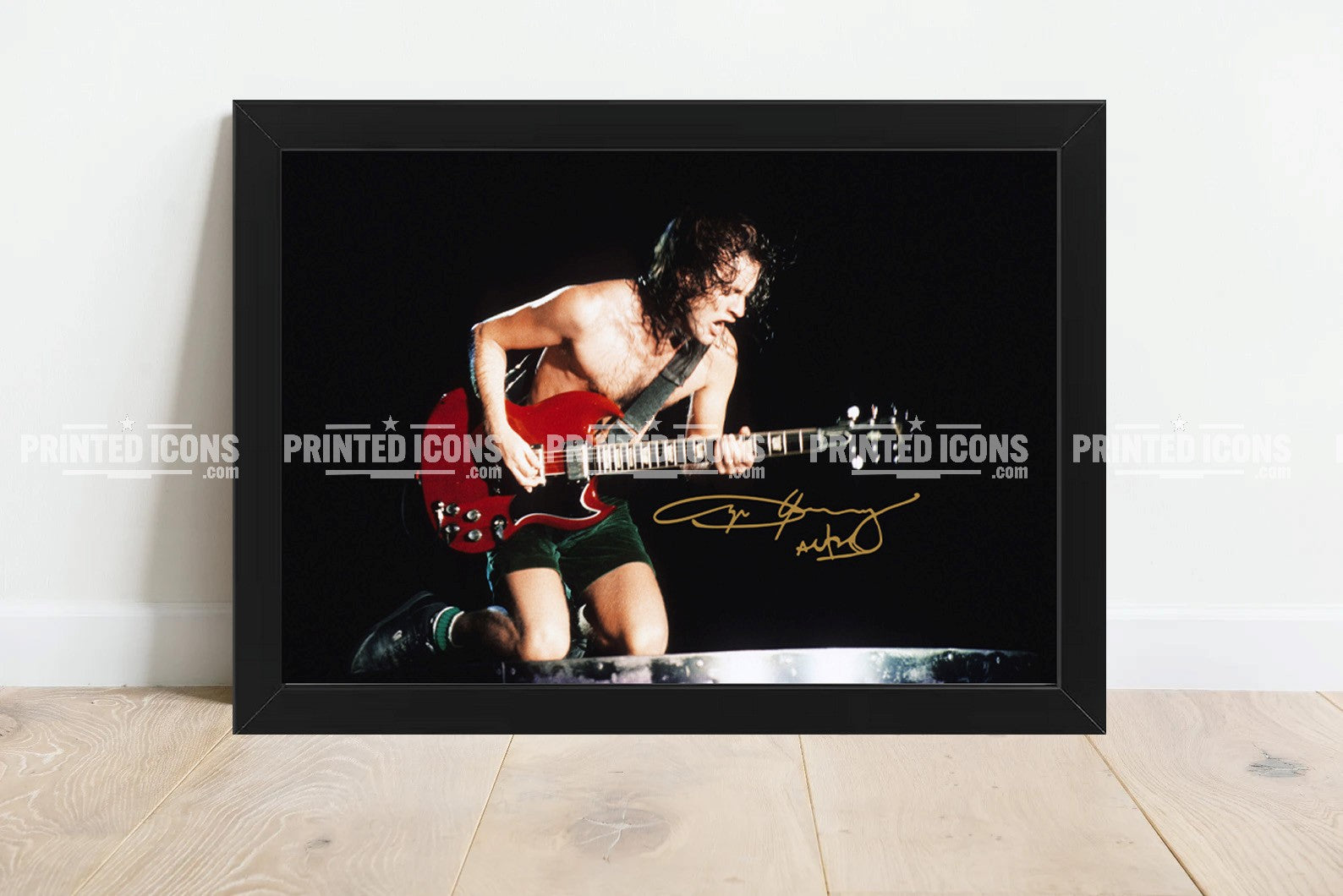 Angus Young AC/DC signed photo print displayed as classic rock wall art