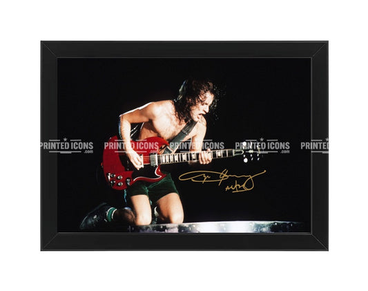 Angus Young AC/DC signed guitar photo print in black frame