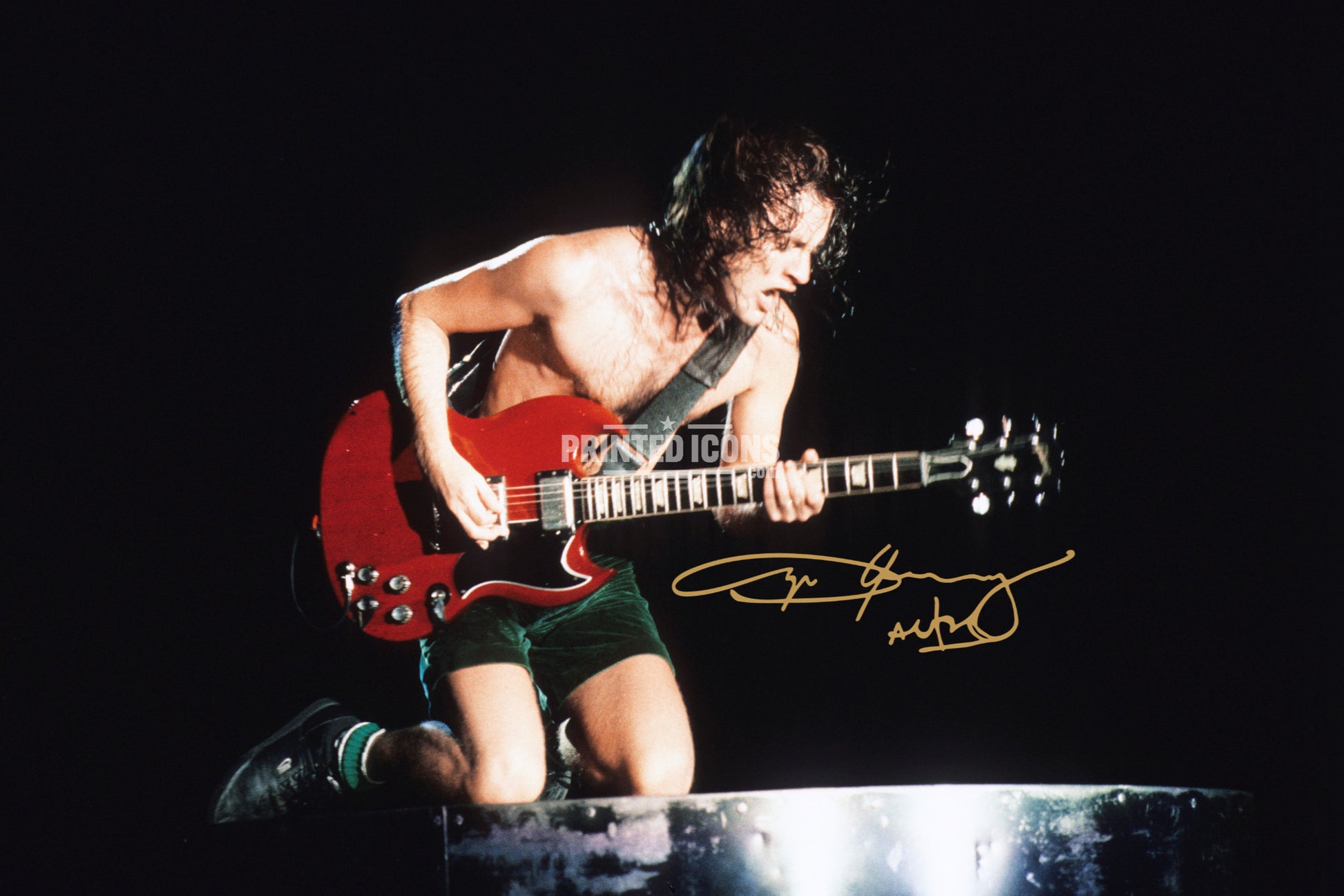 Angus Young signed AC/DC photo print playing guitar with reproduced autograph