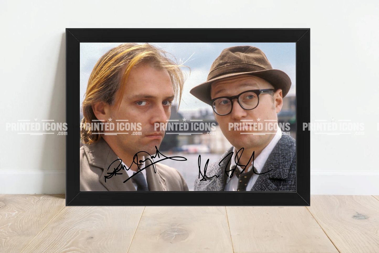 Rik Mayall and Ade Edmondson signed photo print from Bottom with printed autographs. Black frame