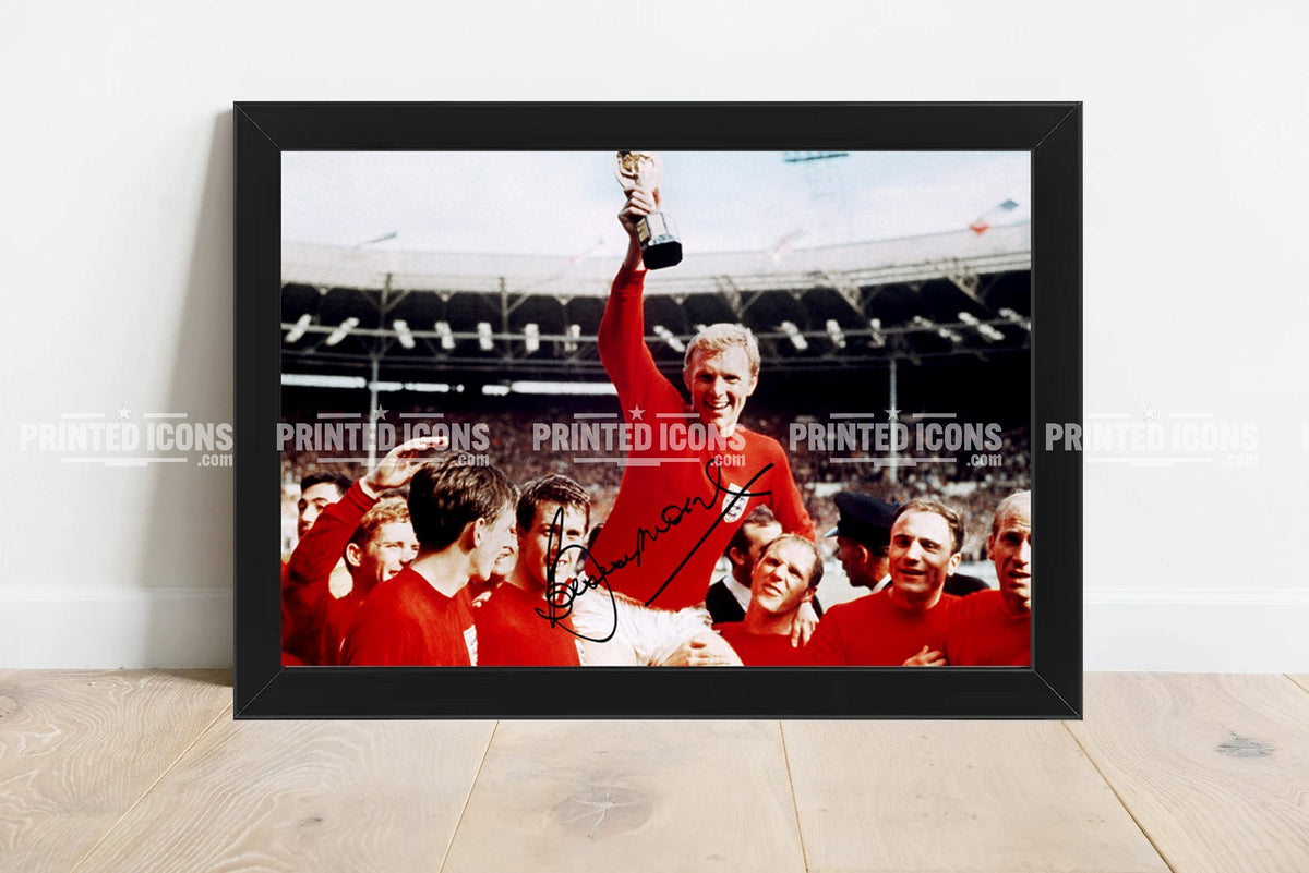 Bobby Moore holding Jules Rimet Trophy with reproduced autograph