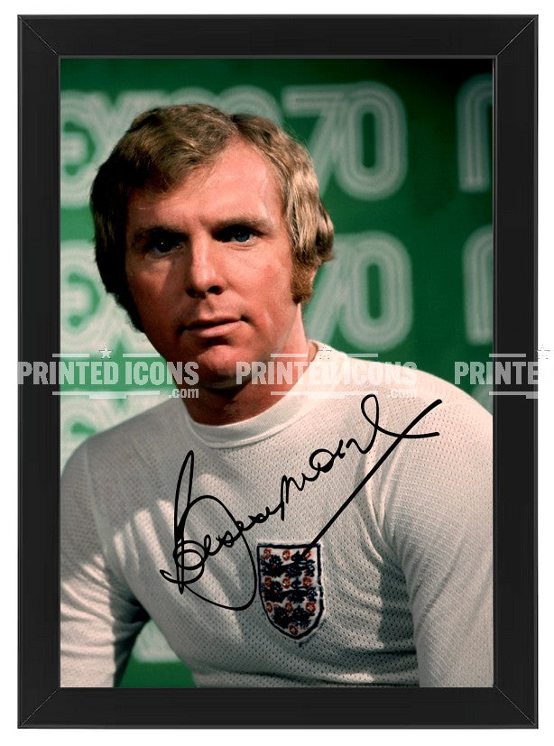 Framed Bobby Moore signed England football memorabilia