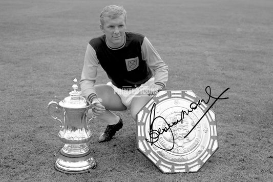 Bobby Moore signed West Ham photo with FA Cup and Charity Shield