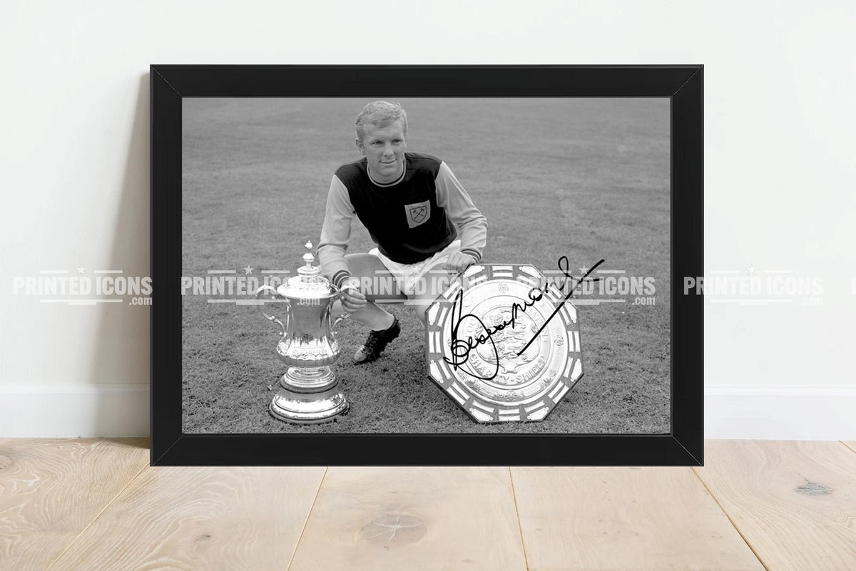 Bobby Moore autograph photo with FA Cup and Charity Shield