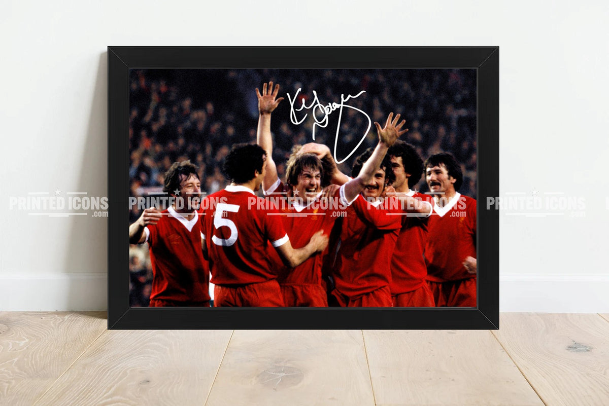 Kenny Dalglish Liverpool football memorabilia framed print displayed on wooden floor