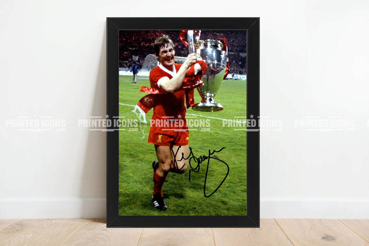 Framed Kenny Dalglish European Cup Liverpool memorabilia displayed against white wall