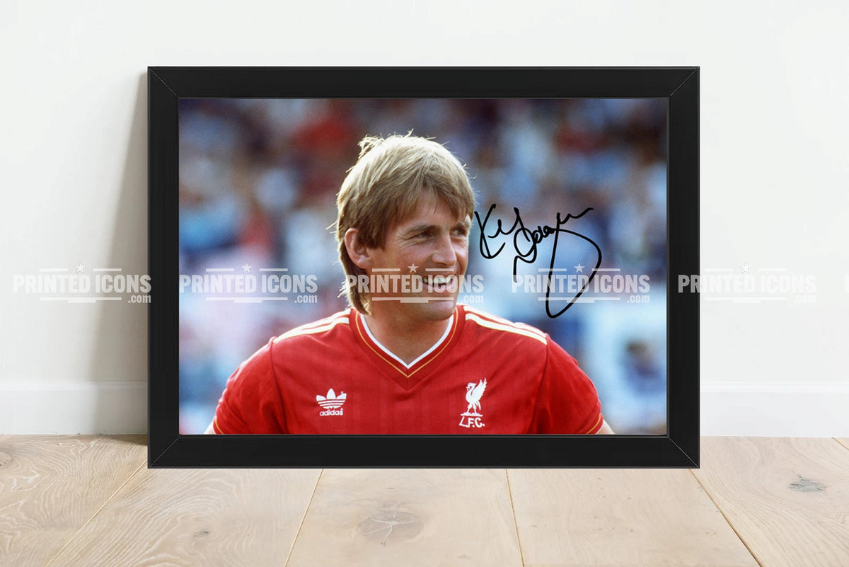 Kenny Dalglish Liverpool football memorabilia framed print displayed against white wall