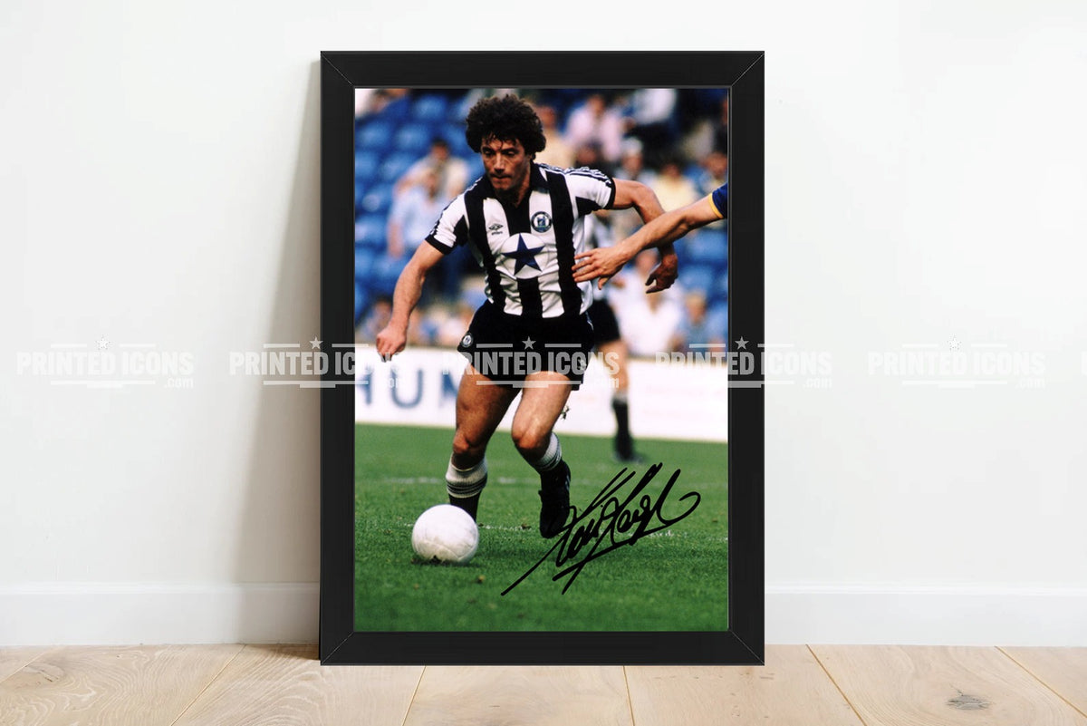 Kevin Keegan signed Newcastle United football print in black frame on display