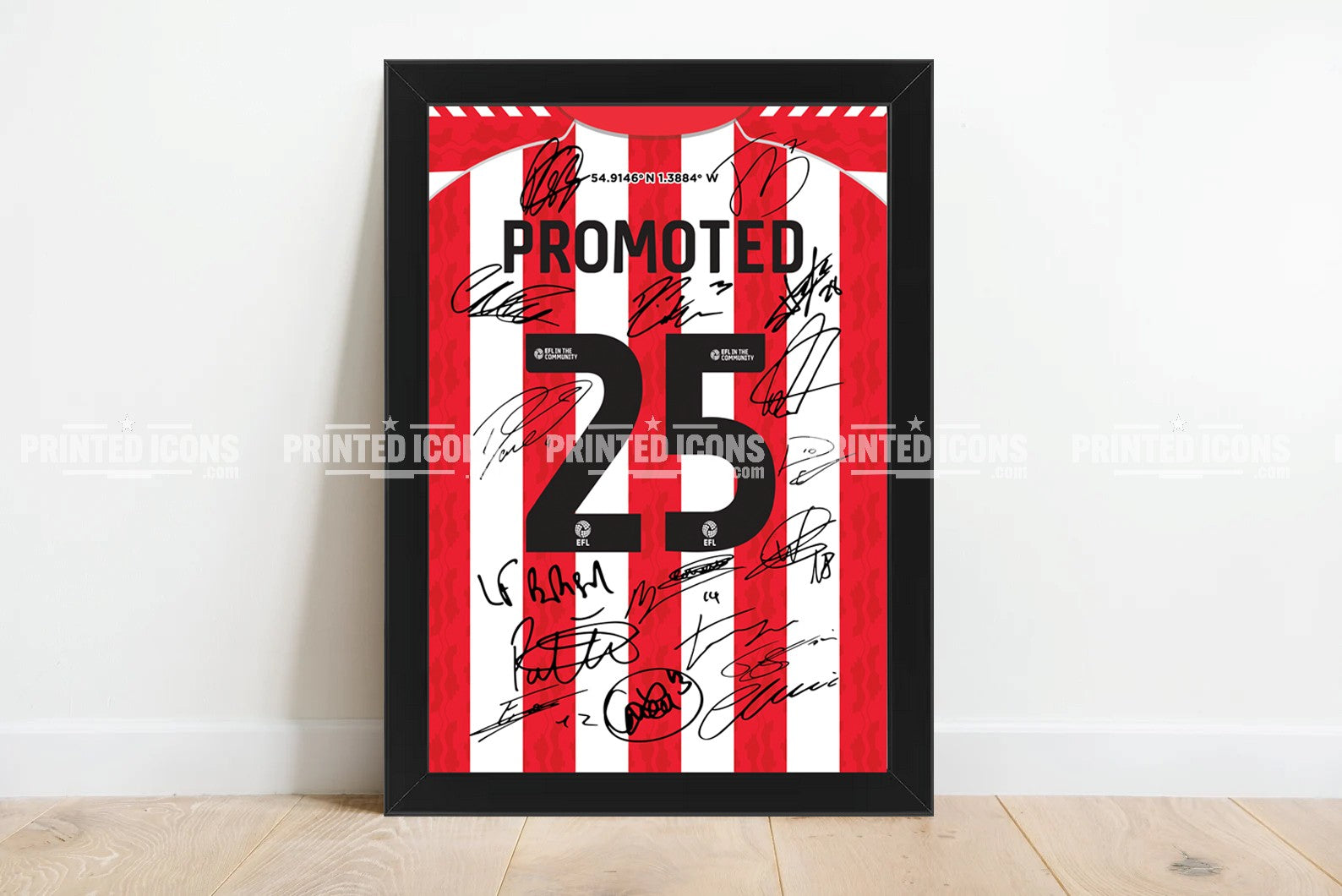A My Store 2025 Sunderland Promotion Multi Signed Print Photo, featuring squad autographs and “PROMOTED 23,” displayed against a white wall on a wooden floor.